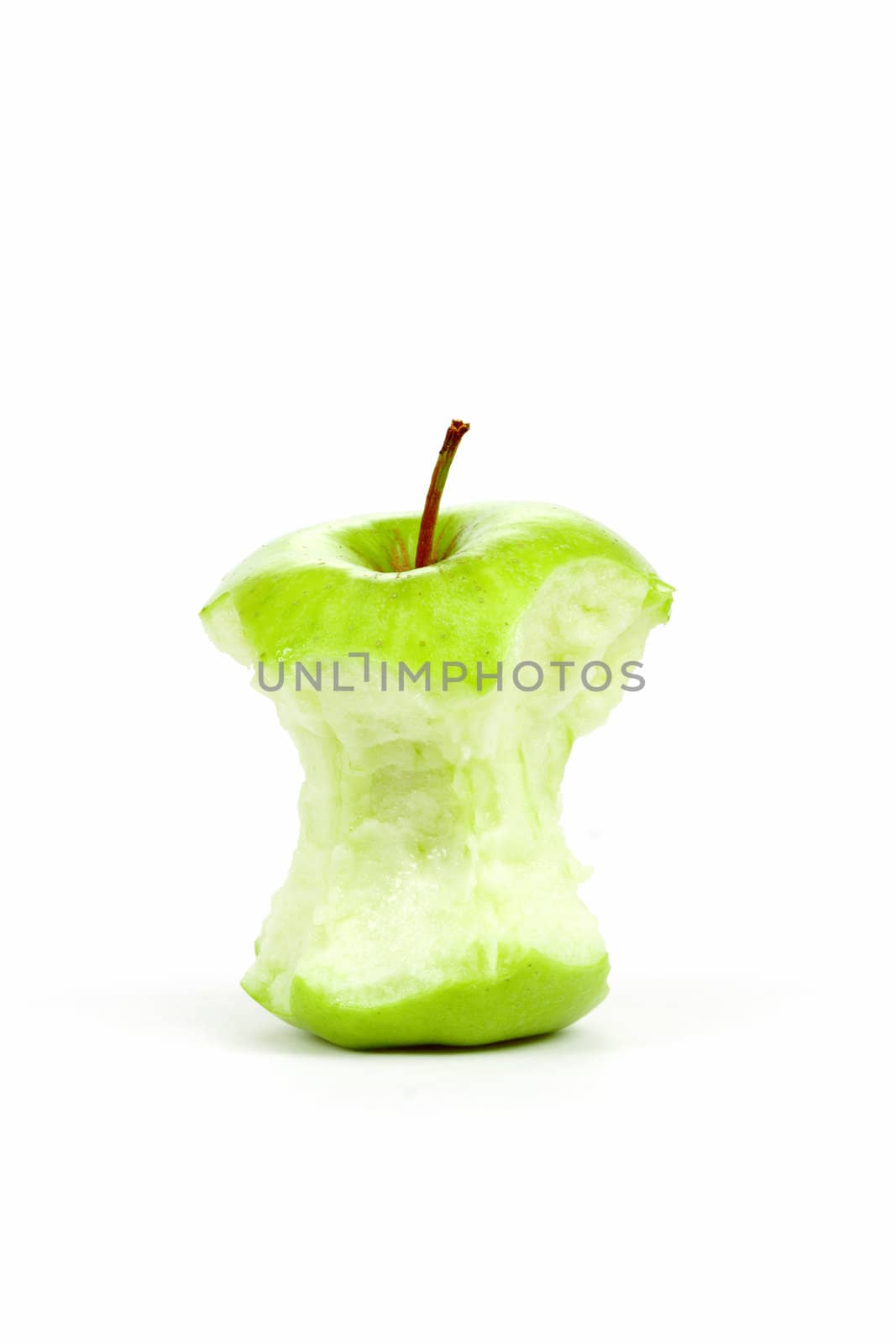 Green bitten apple isolated on white background