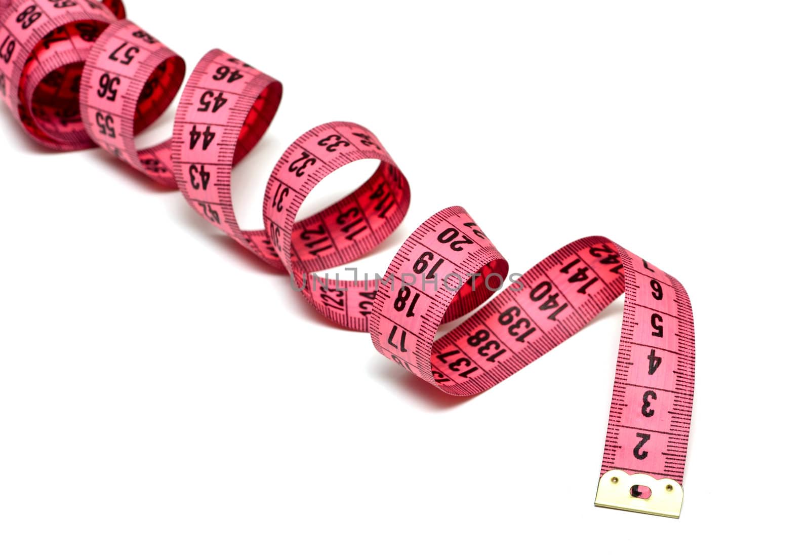 Pink measure tape on white background by DNKSTUDIO