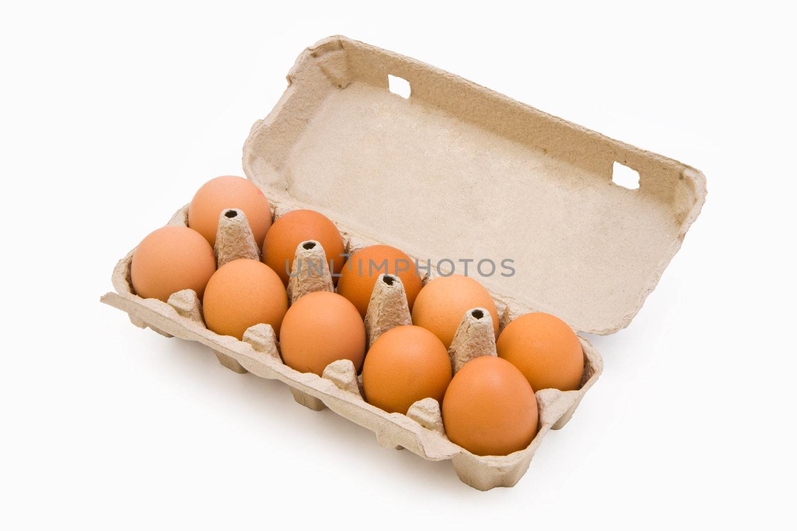 Chicken eggs in a carton box isolated on white
