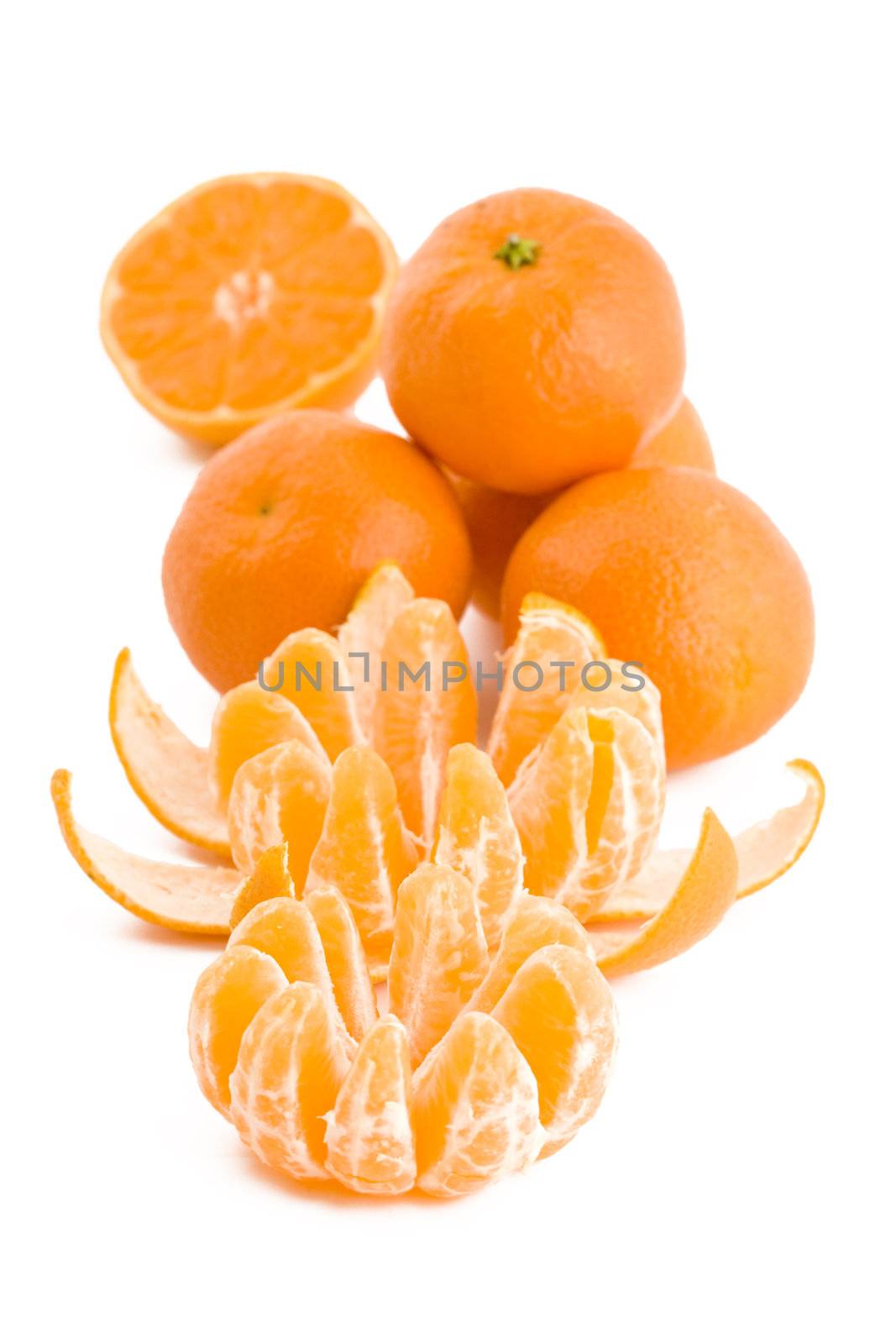 Fresh juicy tangerines in isolated on white background