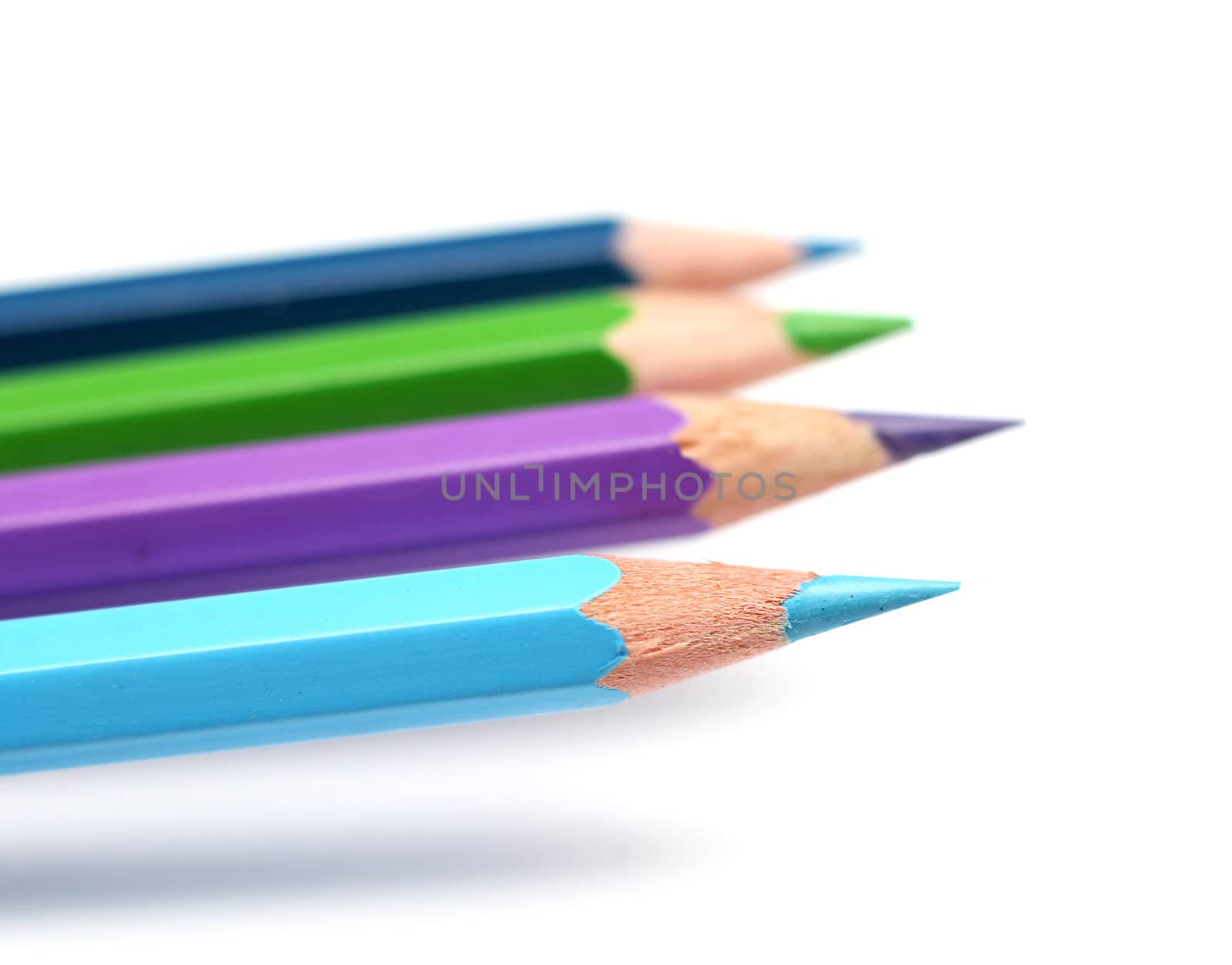 Cool colour pencils closeup drawing writing concept