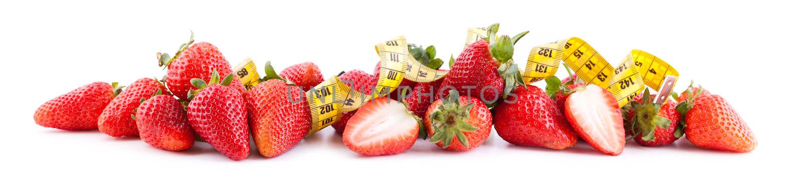 Fresh strawberries with measure tape isolated on white, panoramic view