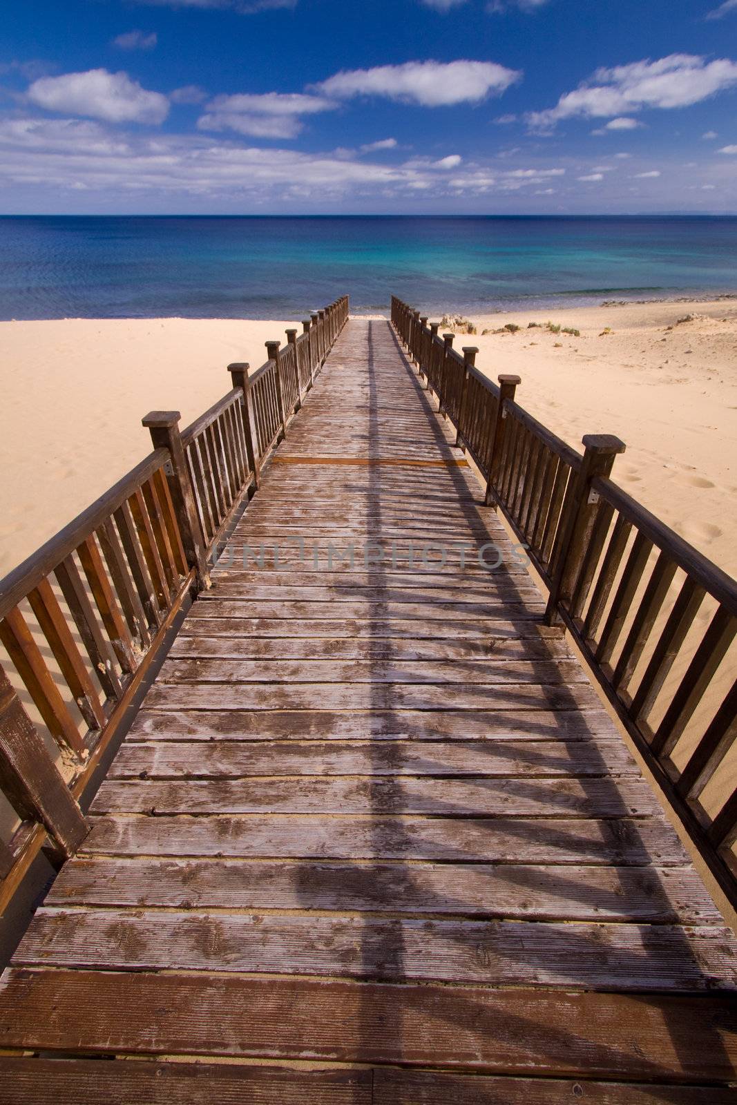 Long wooden footbridge leading to the beach of Porto Santo island