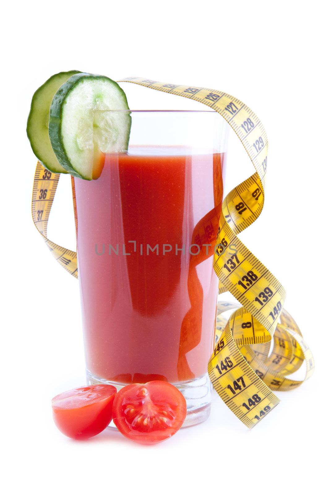 Tomato juice with cucumber slices, fitness tape