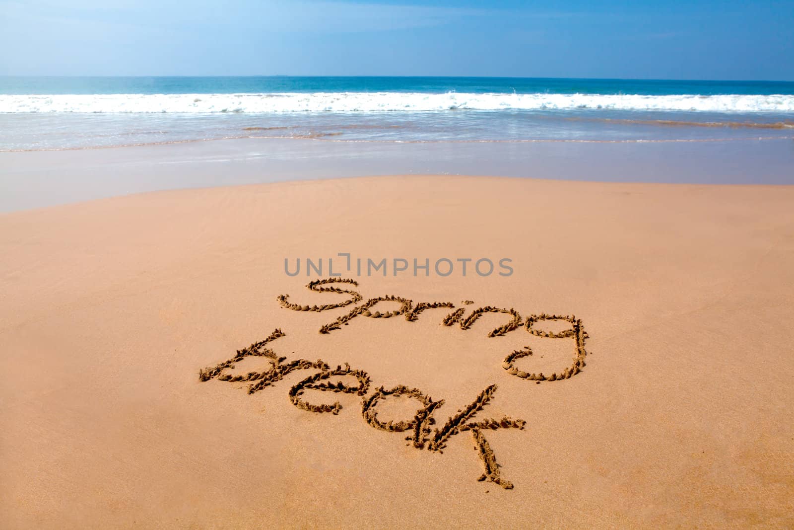 Spring break written in sand - tropical beach by Klemen