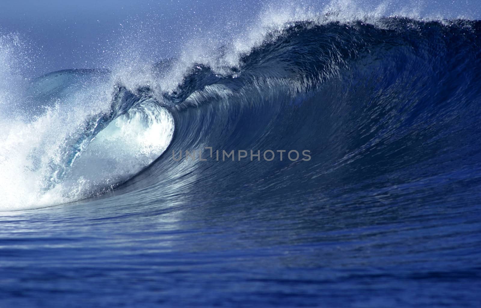 close up image of wave in ocean in Fiji
