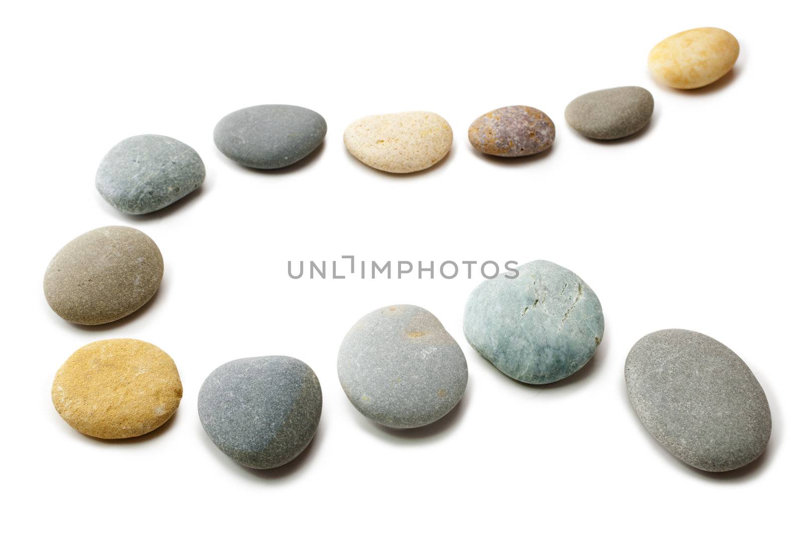 Snaking Line of Twelve Pebbles Steps Isolated by Travelling-light