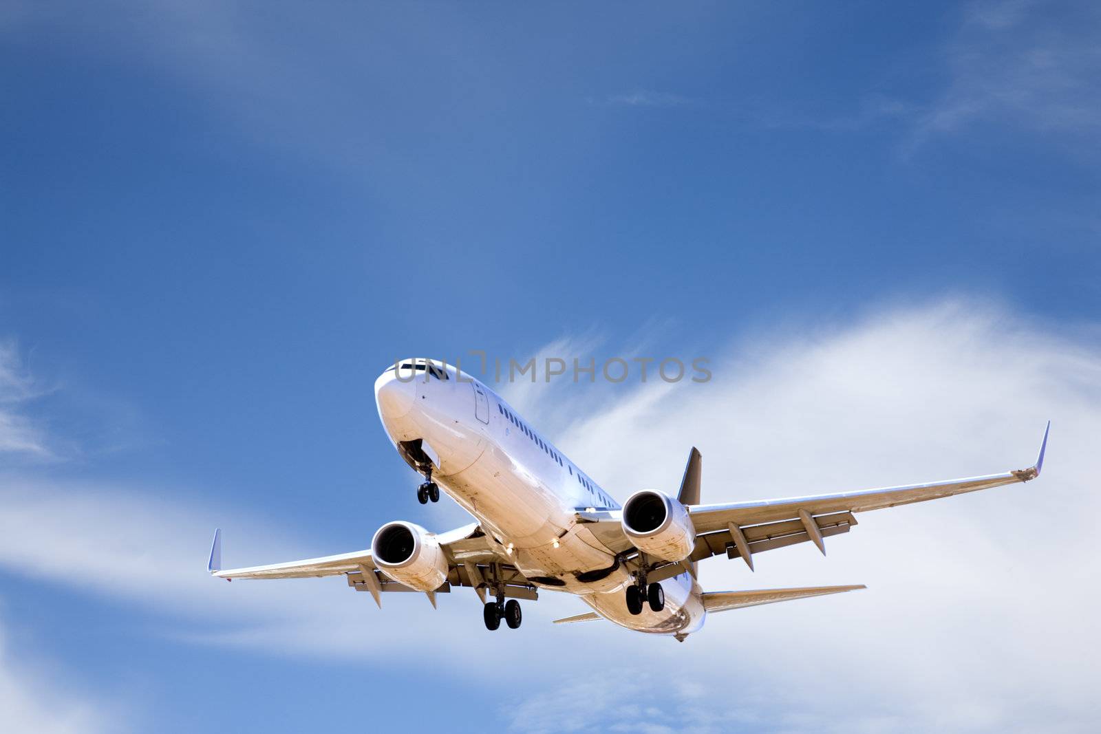 Commercial Aircraft in Summer Sky by Travelling-light