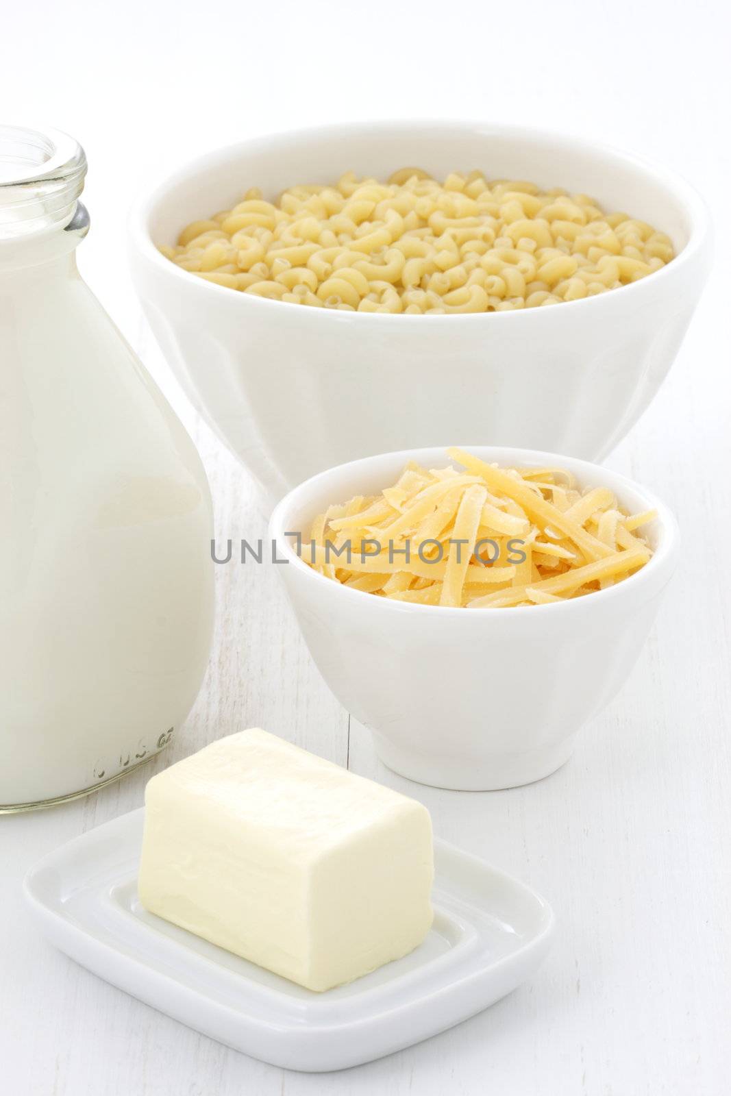 Delicious macaroni and cheese ingredients with a smooth milk cream, fine bread crumbs and aged cheddar cheese. Almost every kid and adult will love it at once. 