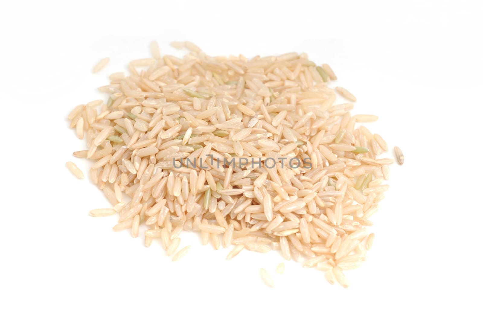 Brown Rice which is a whole grain on a white background