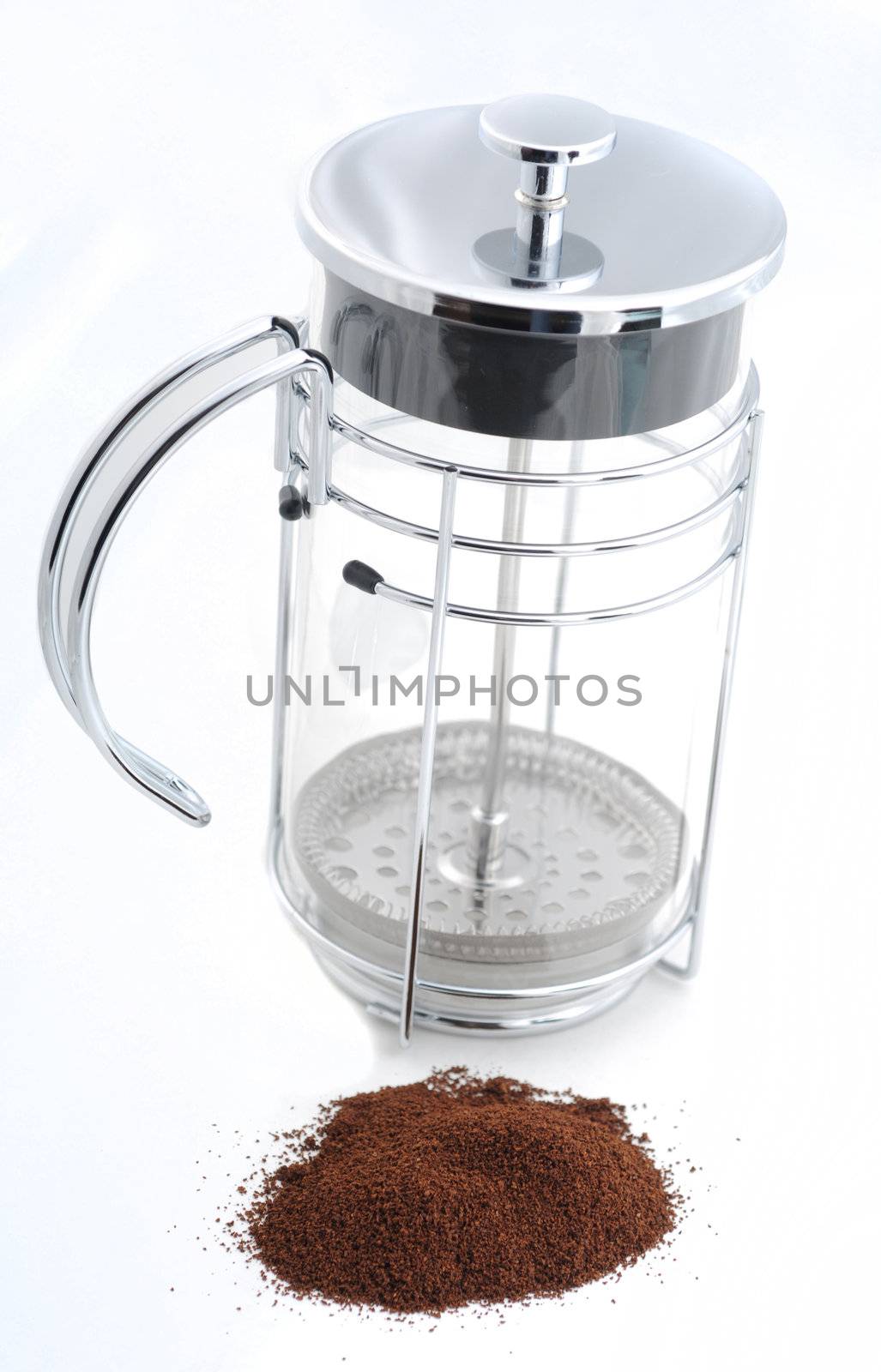 Coffee press with ground coffee by ftlaudgirl