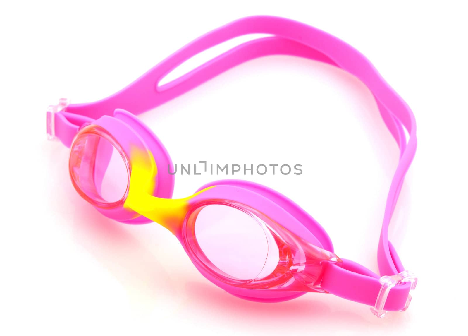 Pink and yellow swimming goggles isolated on white background by ftlaudgirl