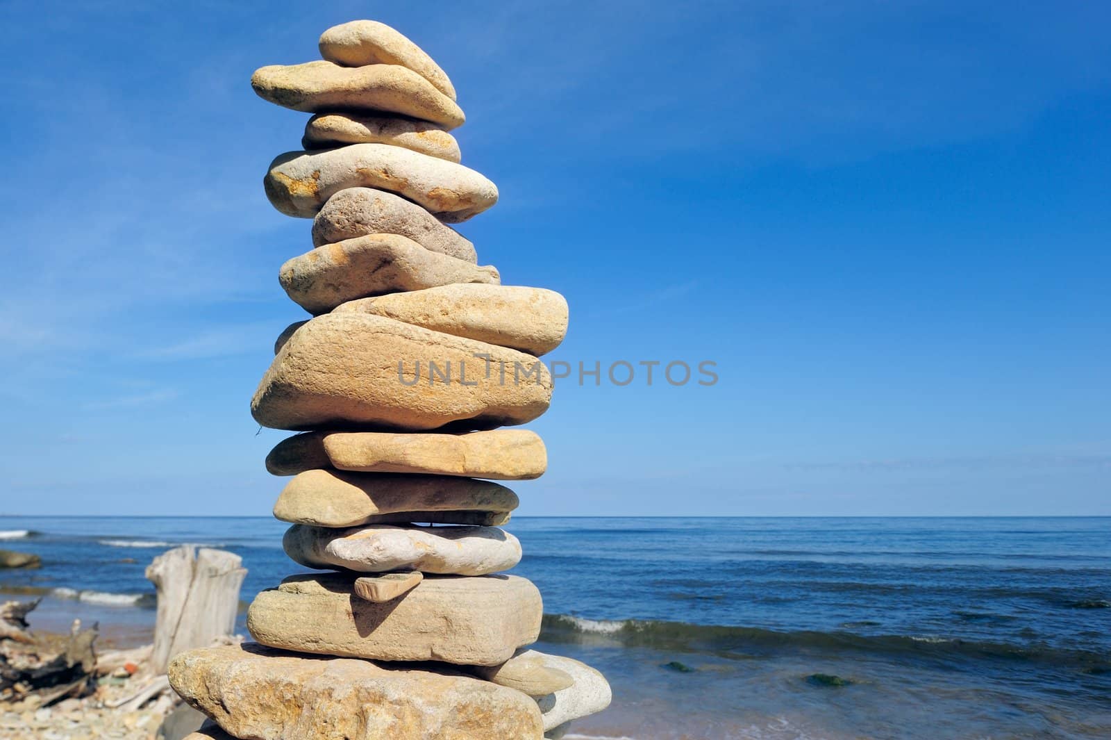 Balancing of pebbles each other on the seacoast