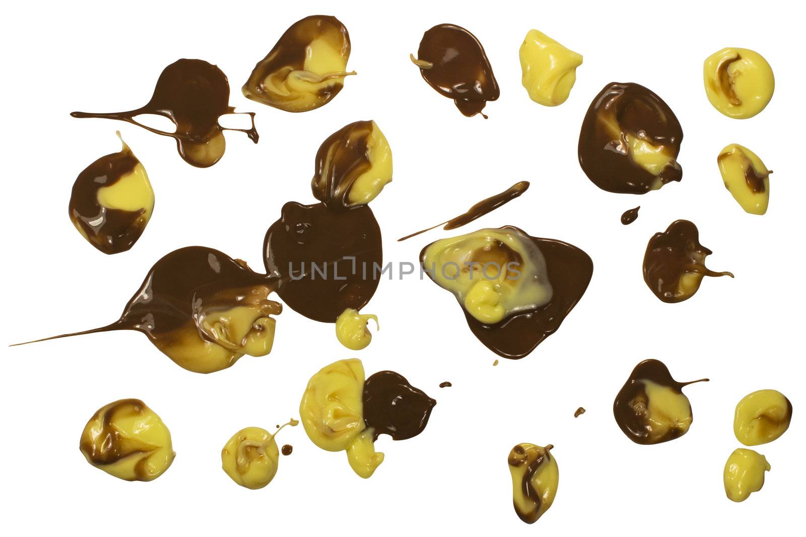 Chocolate and vanilla pudding splats isolated on white background. Clipping path.