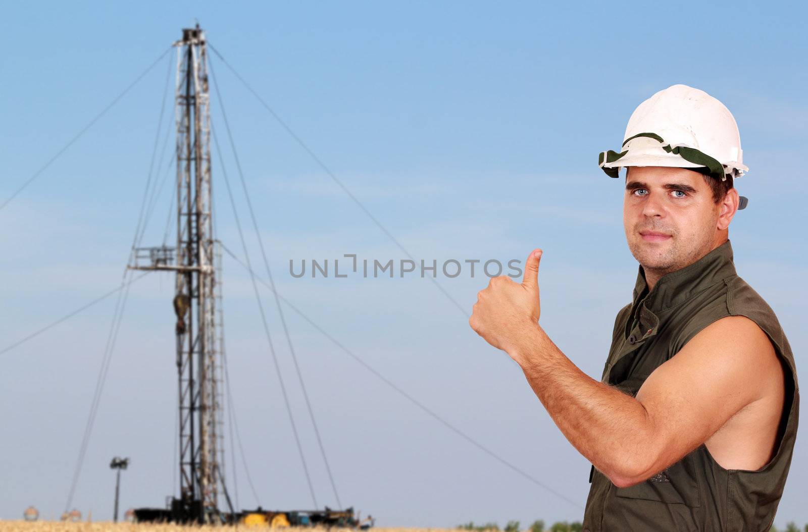 oil worker with thumb up 
