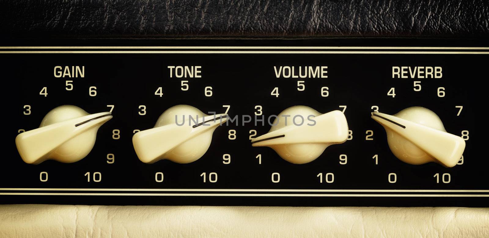 retro guitar amplifier control panel, close up