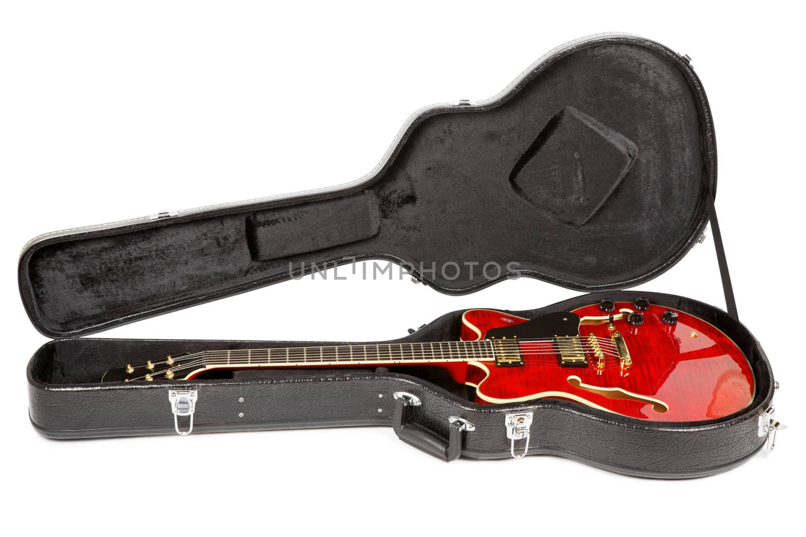 red electric semi-hollow guitar in hard case, isolated on white