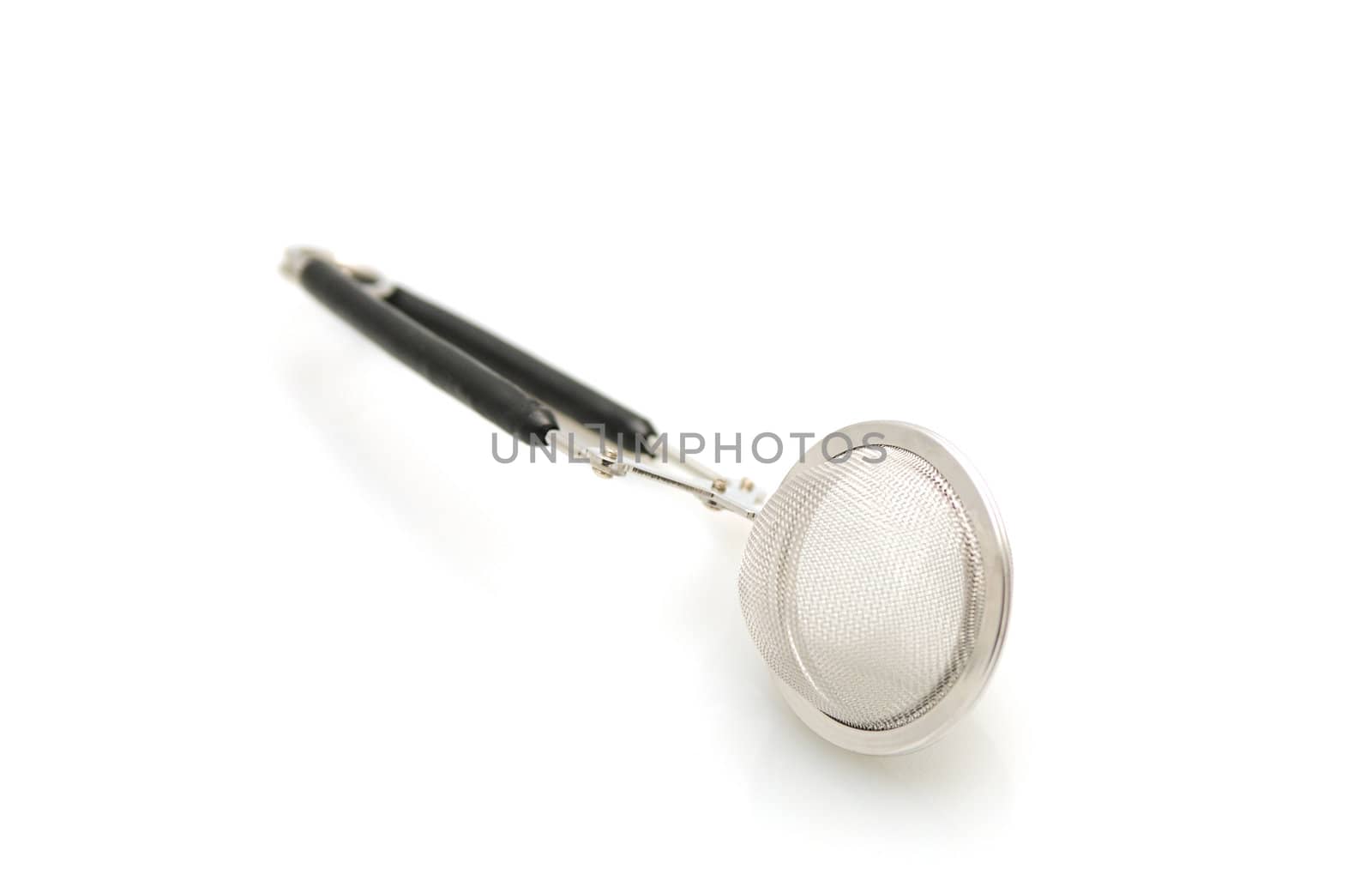 Tea strainer on white background by ftlaudgirl