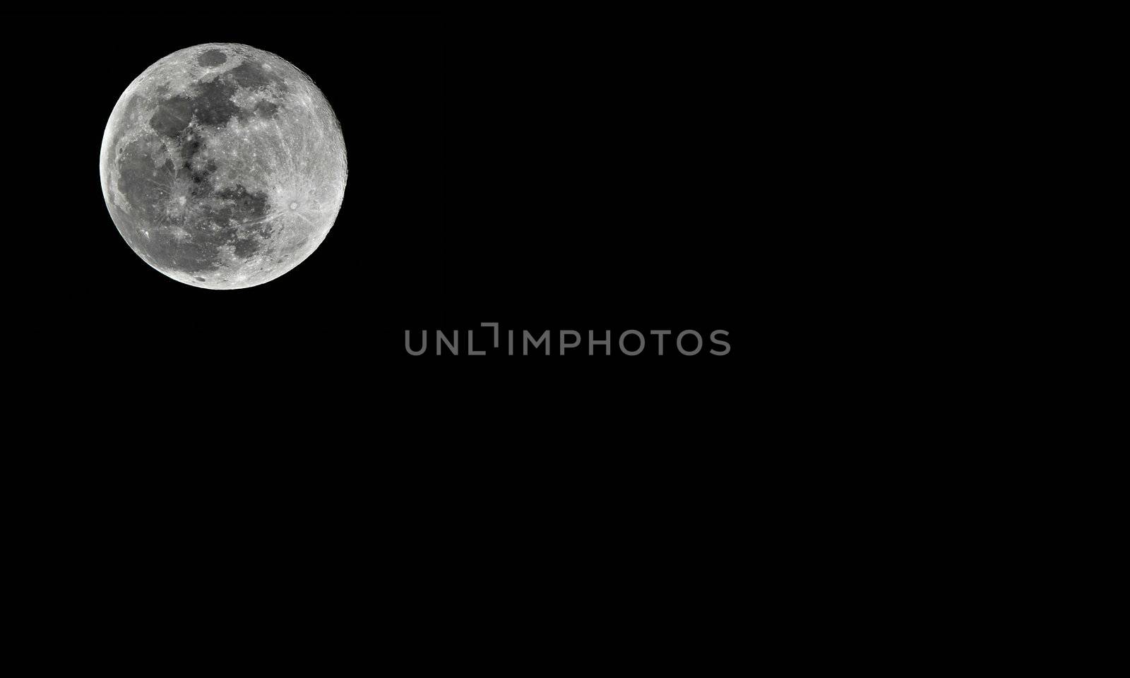 Detailed full moon on black background