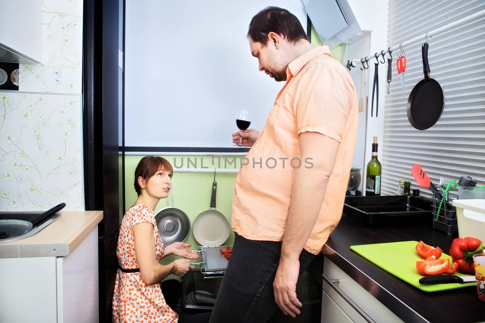 problem family - wife cooking, husband drink wine