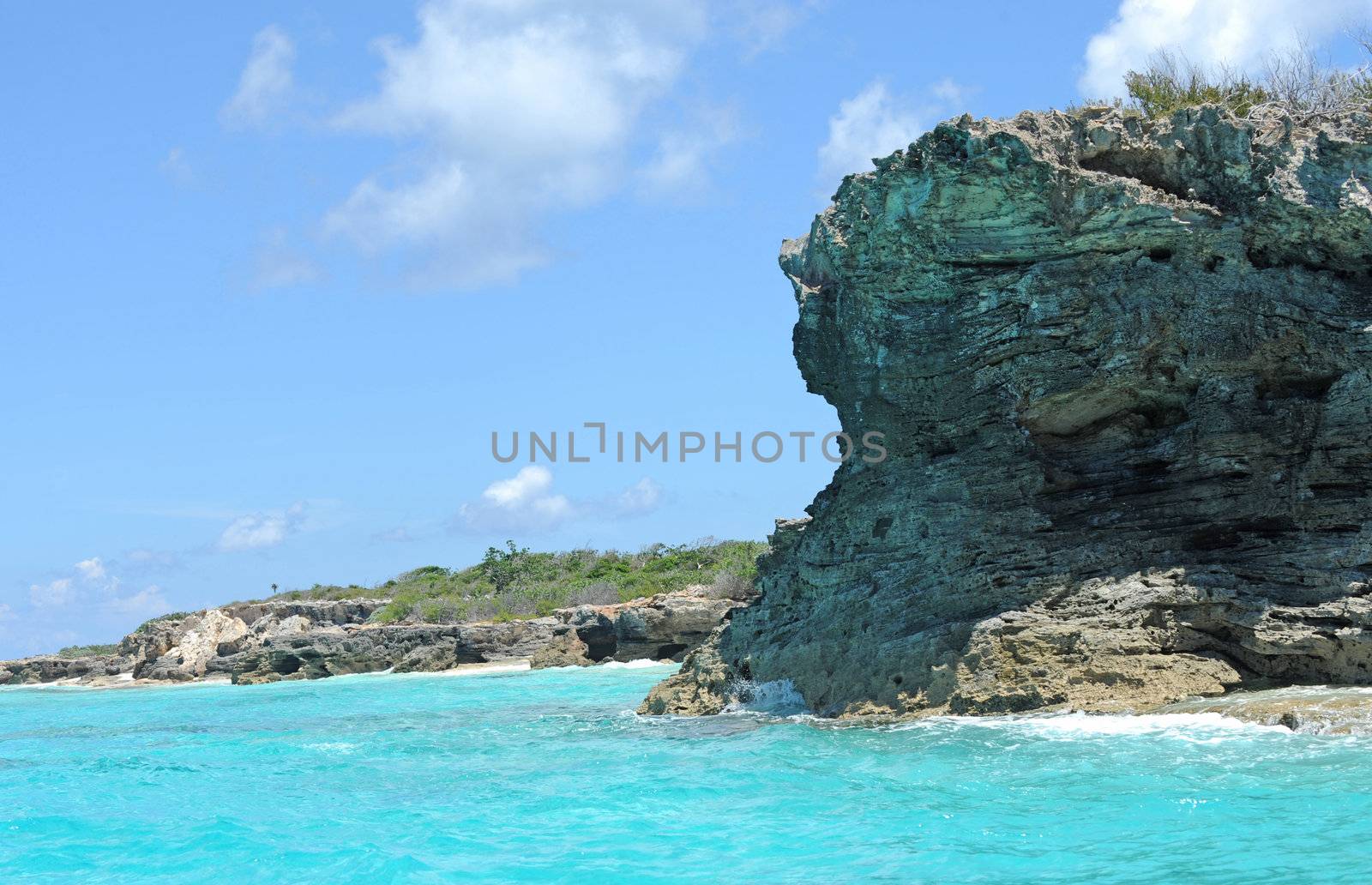 Rocky beach in scenic tropical setting by ftlaudgirl