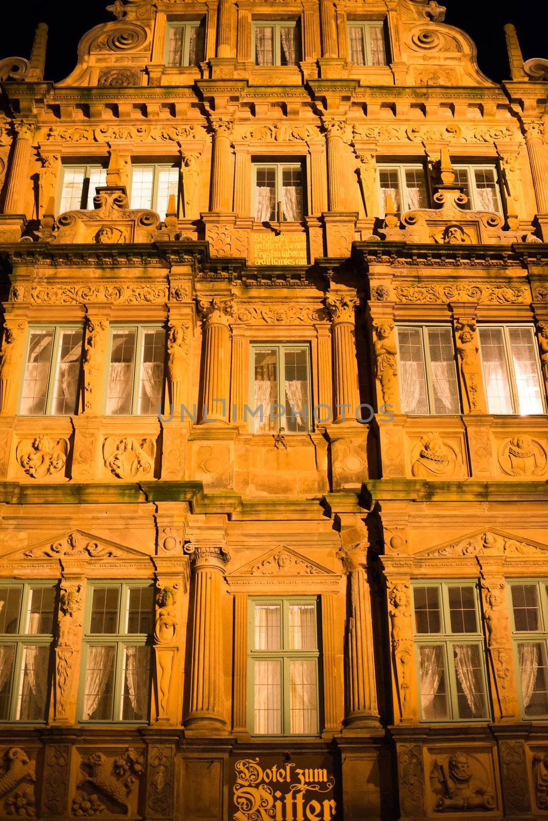Heidelberg, Germany - February 2, 2013: Traditional Hotel Zum Ritter in Heidelberg, Germany in the evening of February 2, 2013. Heidelberg is a well-known tourist attraction due to its old history and beautiful location at the Neckar river.