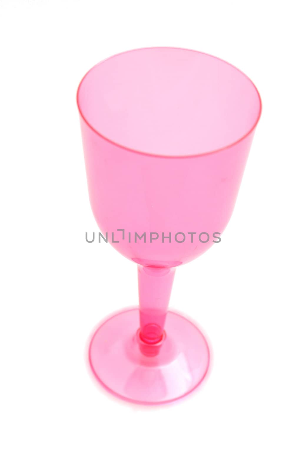 Pink plastic cup isolated on white background by ftlaudgirl
