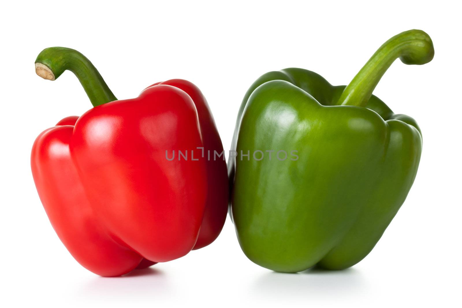 Paprika (pepper) vegetables on white background. Red and green one