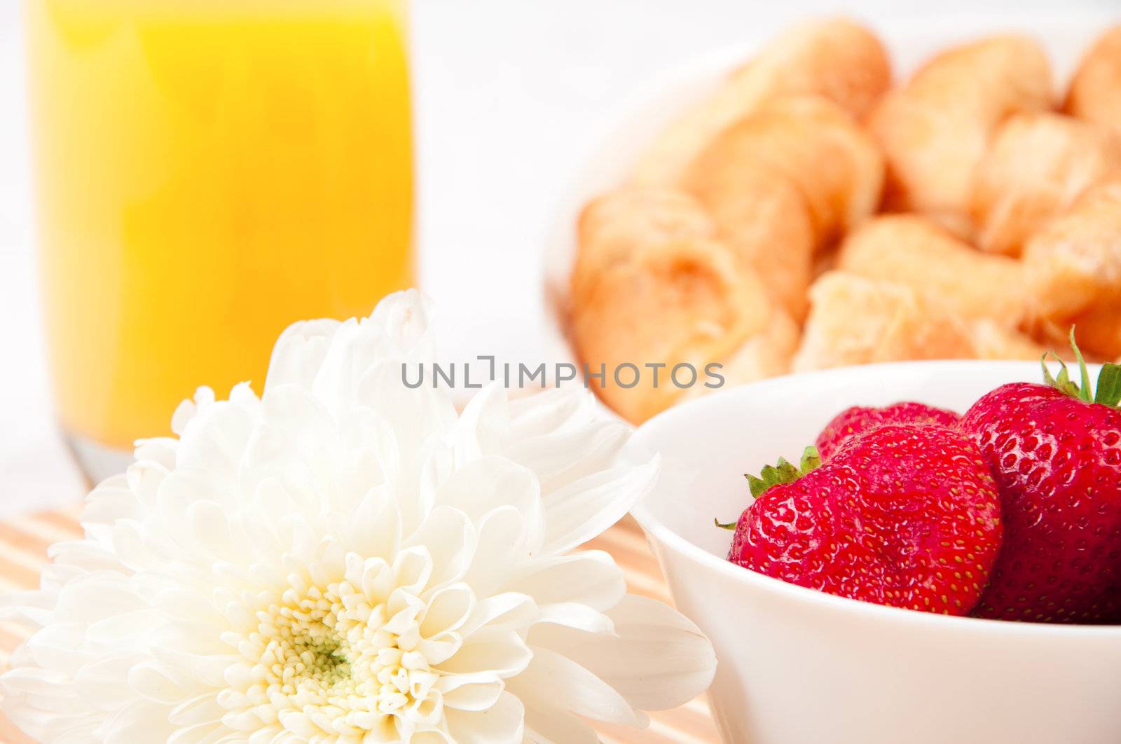 Breakfast with berries,orange juice and croissant, early breakfast