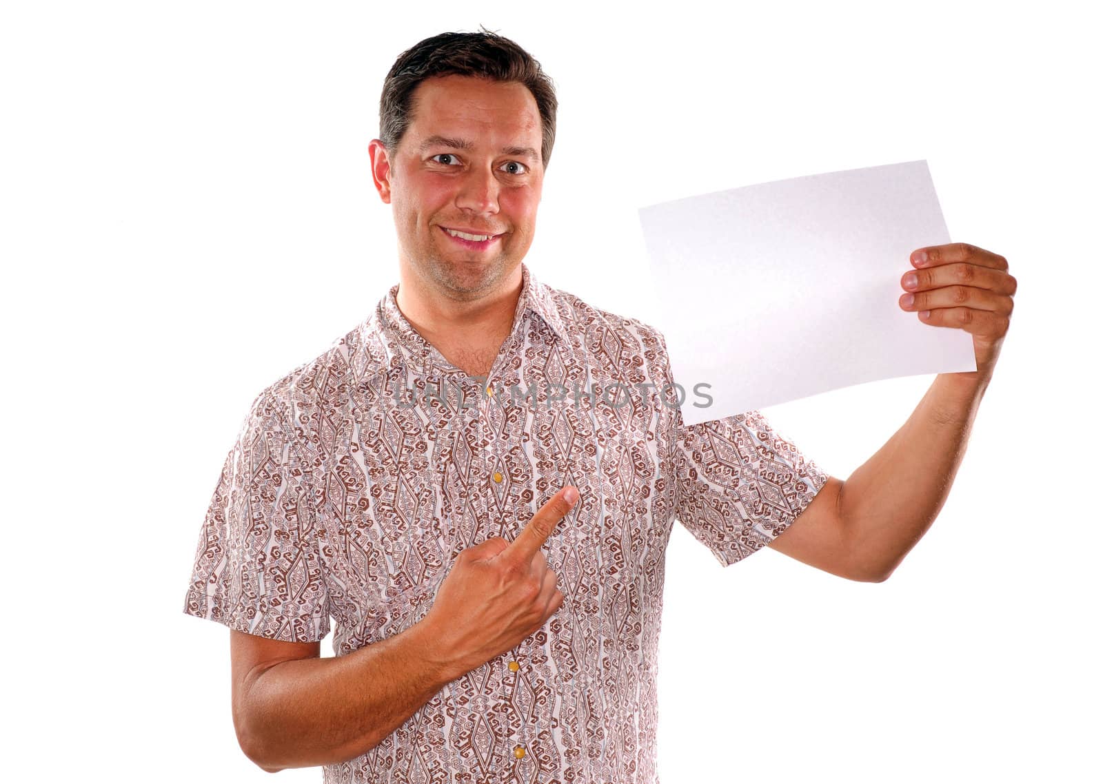 Young man pointing to blank piece of paper for advertisement

