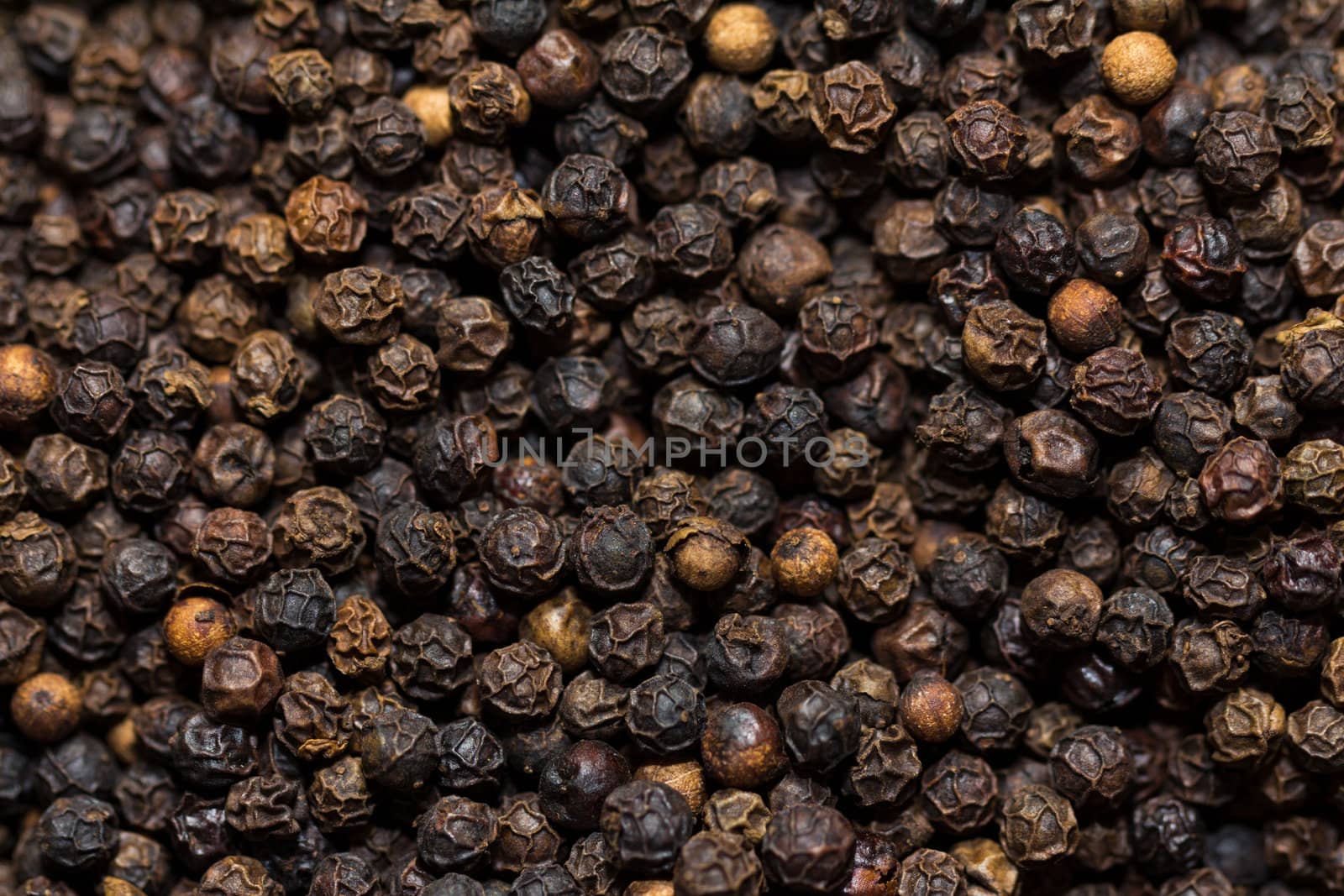 A back ground of black pepper corns