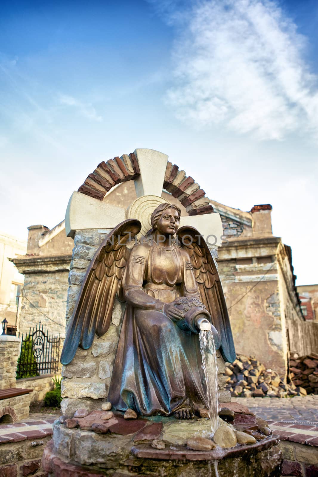 statue with jar in Kamenetz-Podolsk , Ukraine
