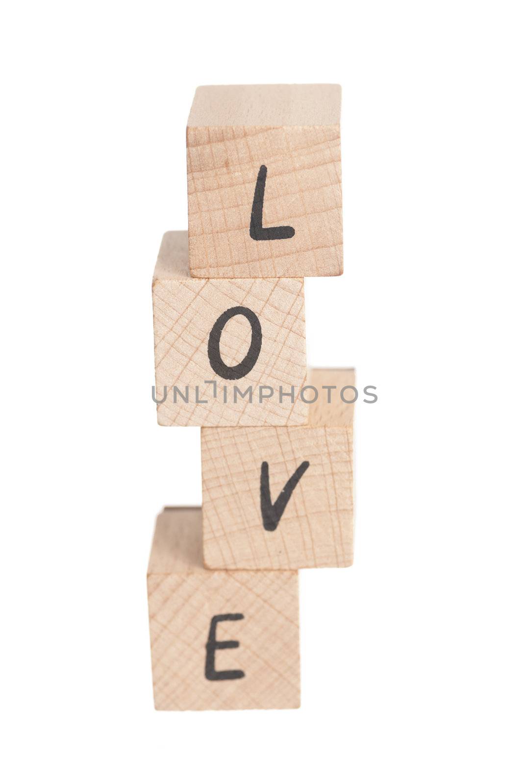 The word love constructed out ouf wooden blocks.