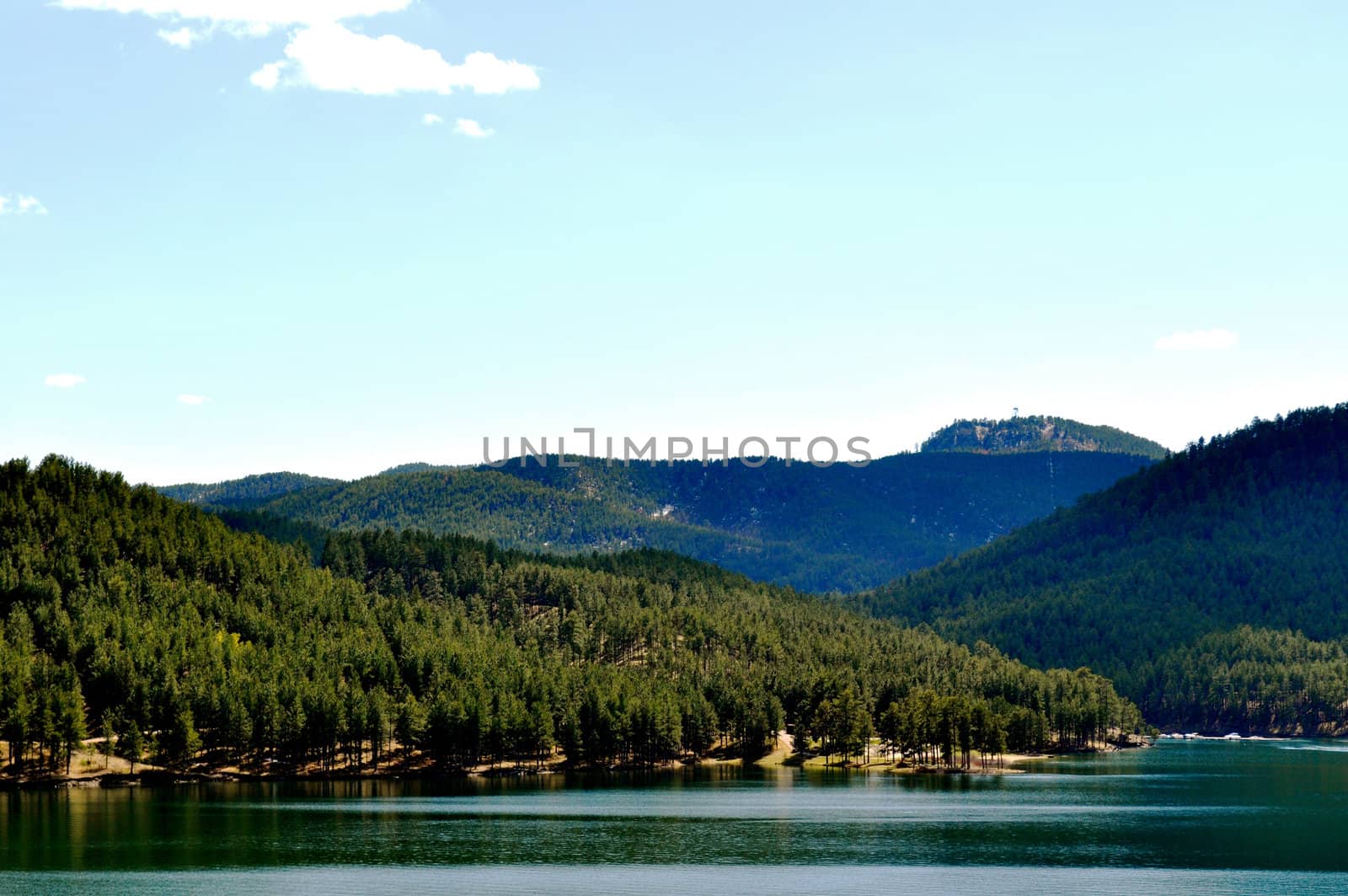 Black hills and water background