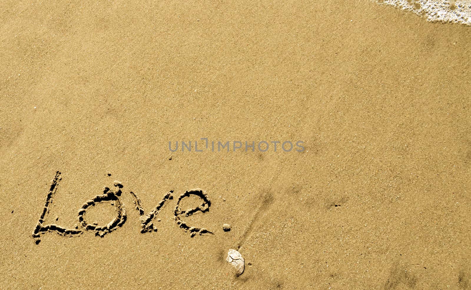 Love written in the sand with wave 20-1 by RefocusPhoto