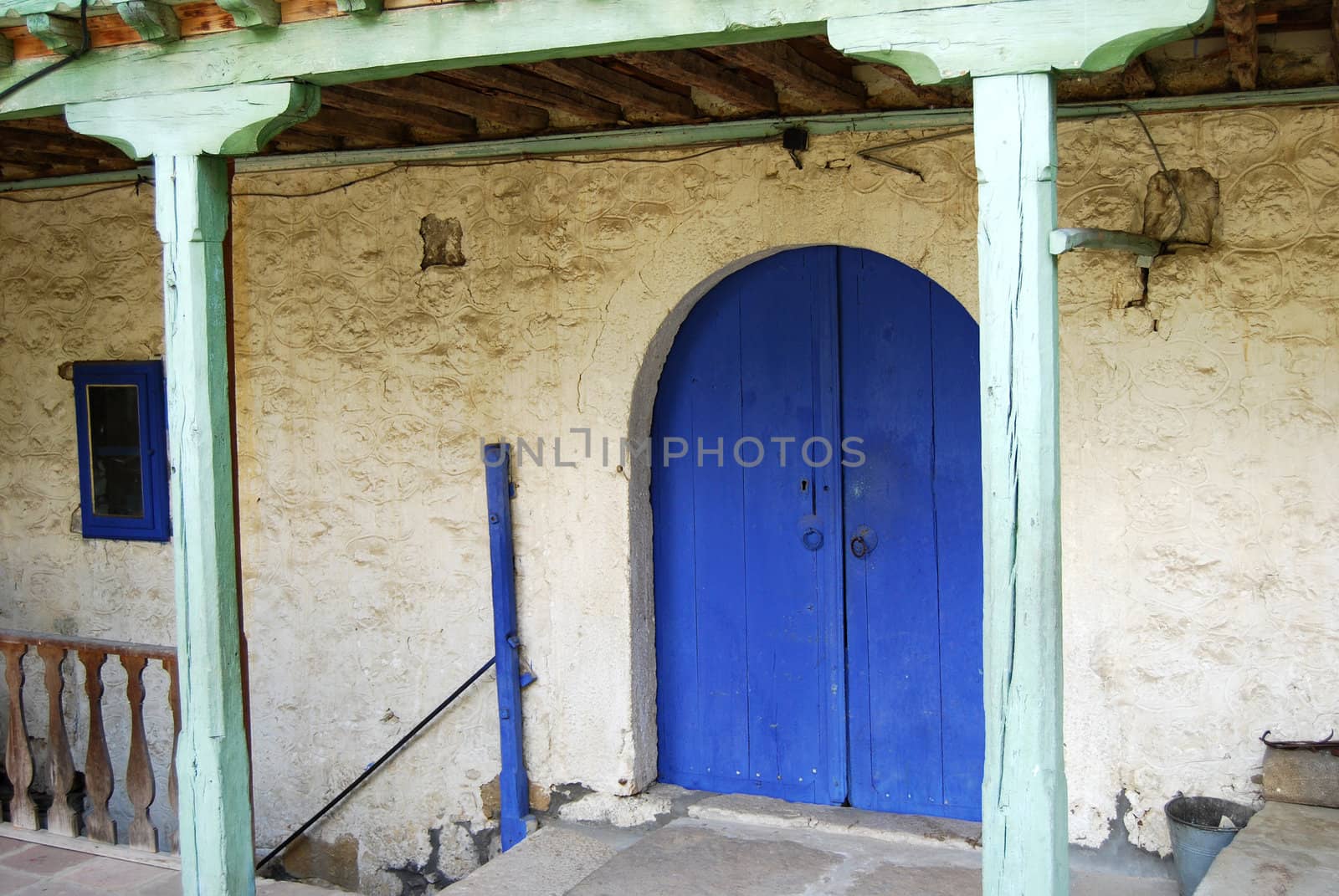 Old orthodox monastery blue wooden back door