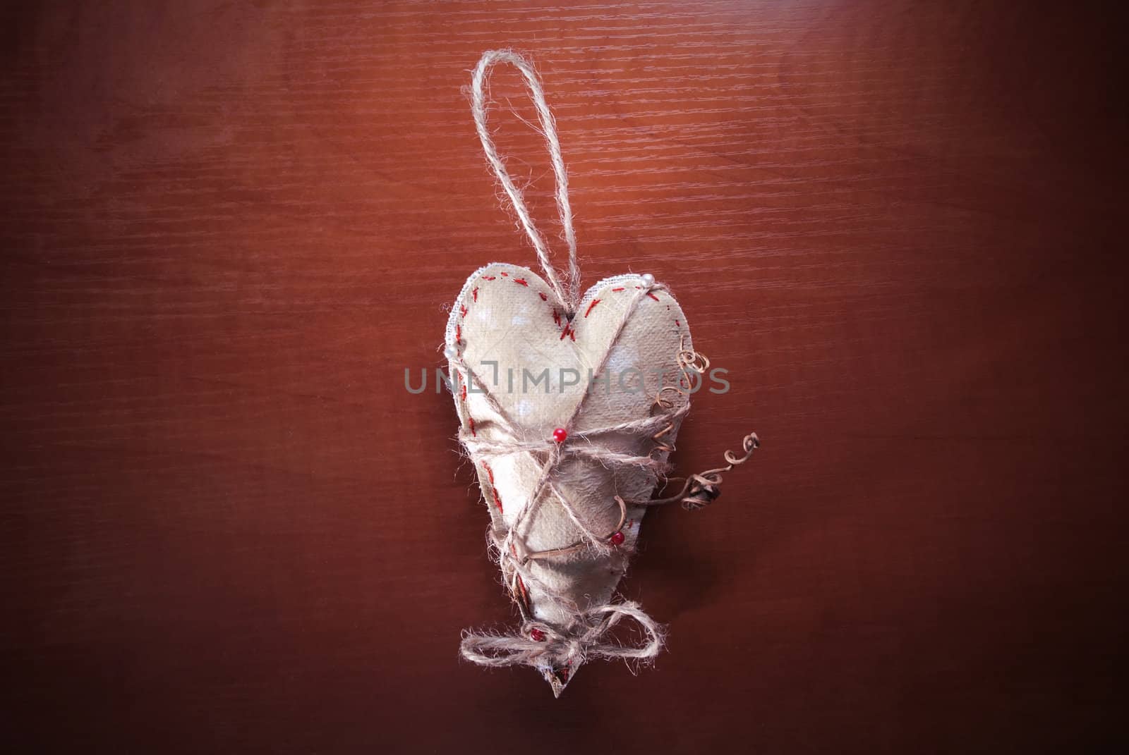 Rope heart on the wood backgroumd. Love background