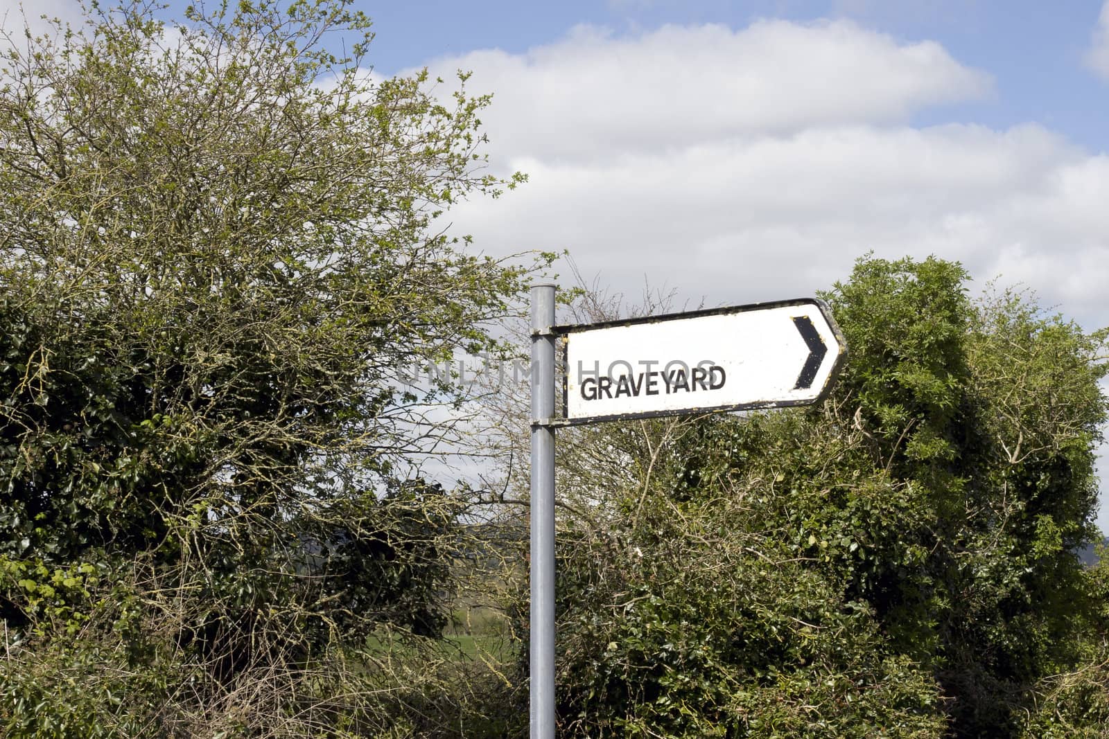 direction sign for a graveyard in the Irish countryside