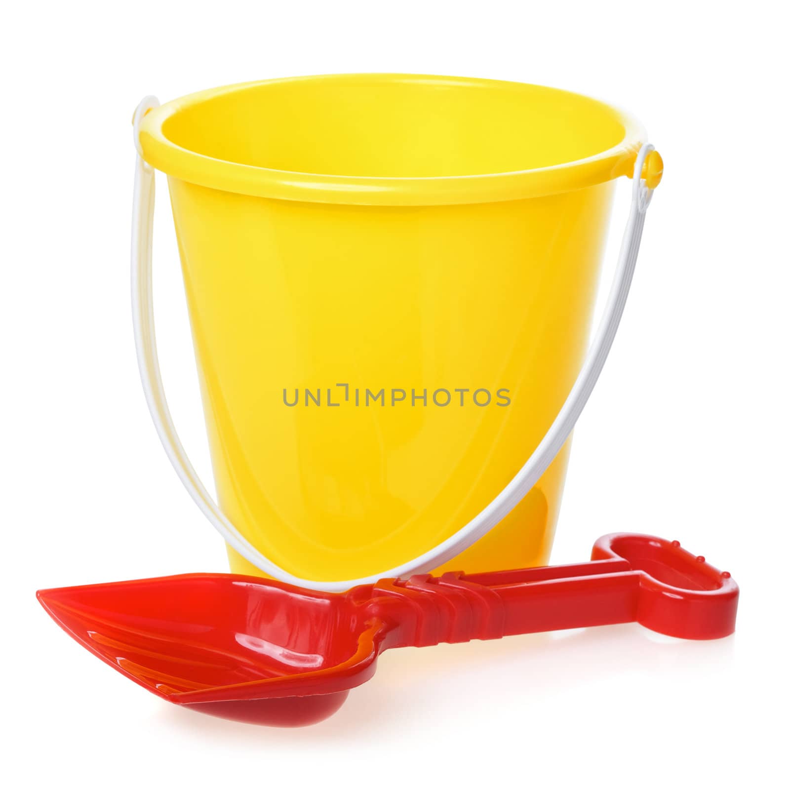 yellow toy bucket and red scoop, isolated on white