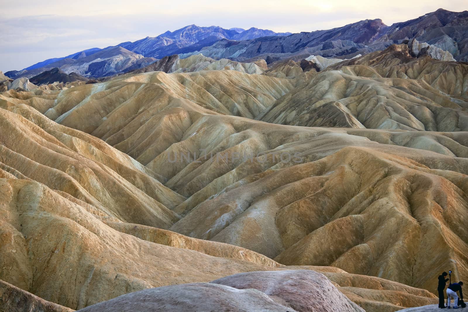 Photographers at Zabriski Point Mudstones form Badlands  Death Valley National Park California