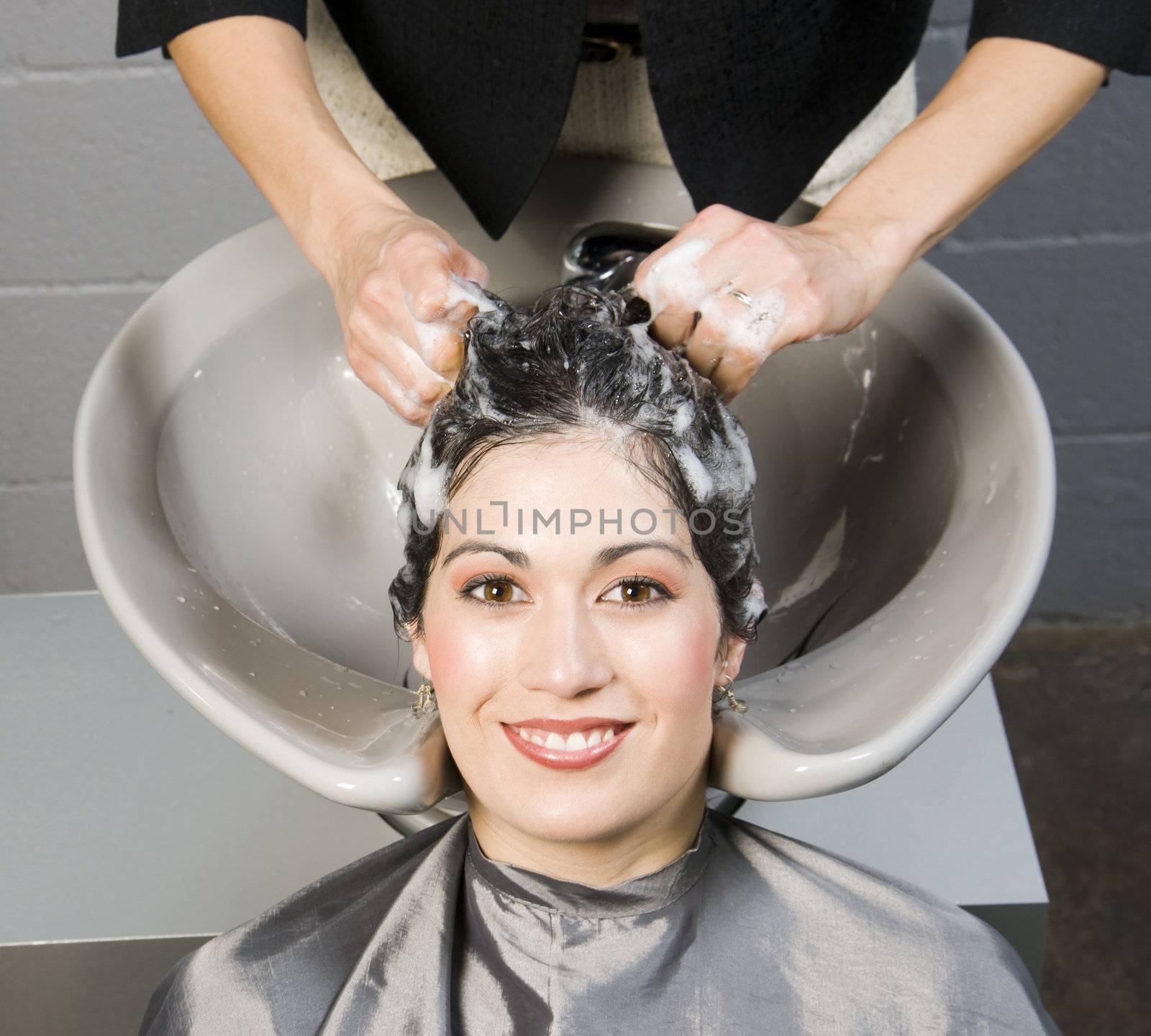 Attractive Woman Gets Spa Salon Shampoo and Conditioning by ChrisBoswell