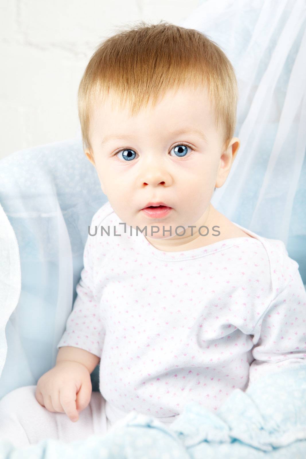 funny baby in cradle, happy and smiling