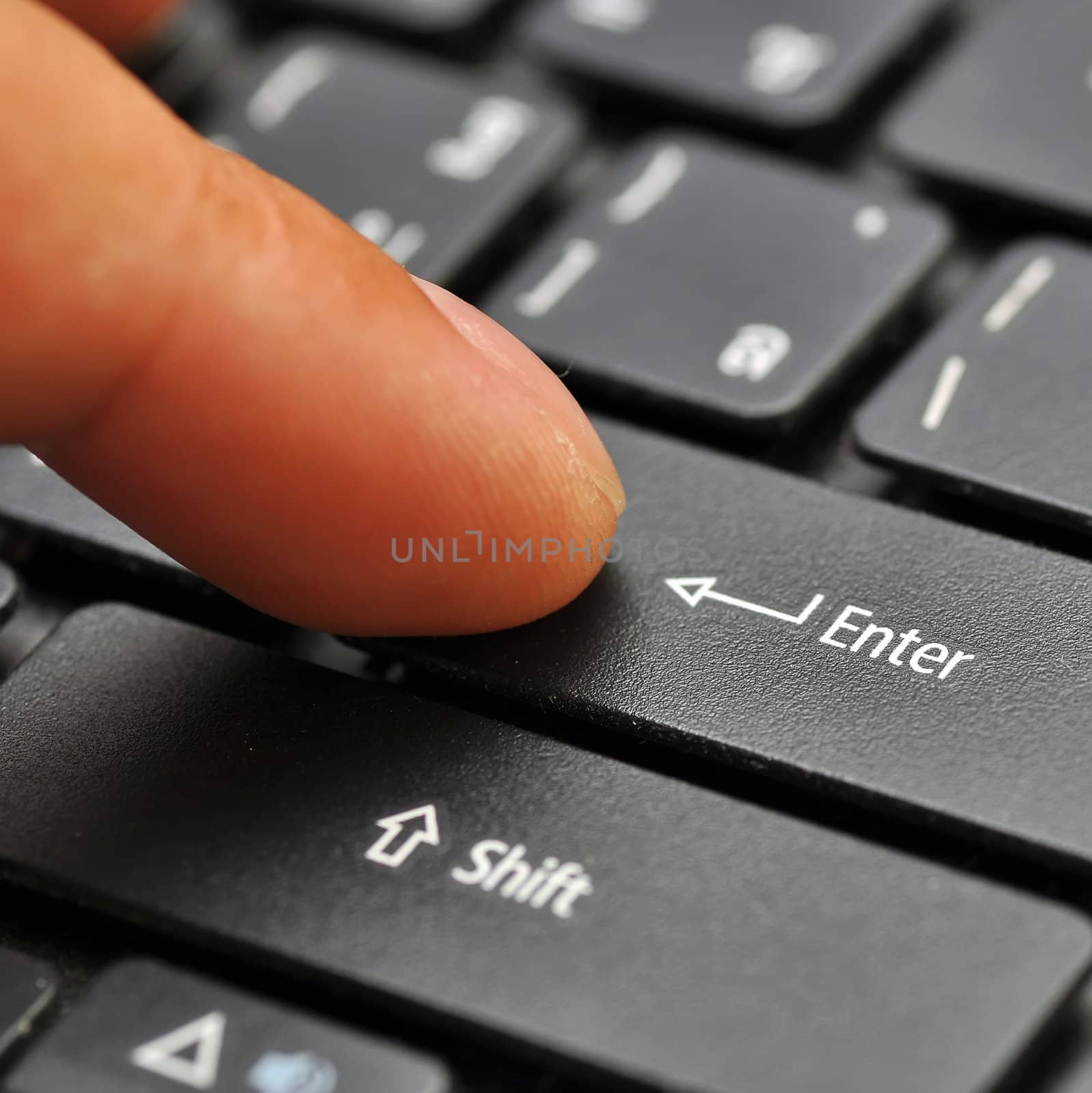 Finger on computer keyboard by phanlop88