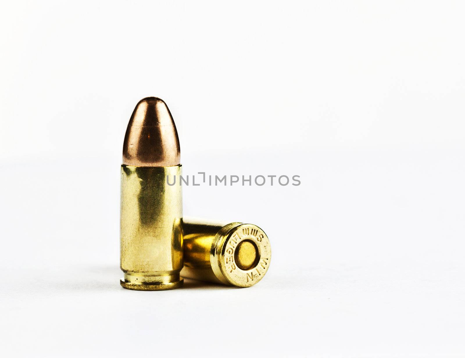 9 mm bullets on a white background isolated