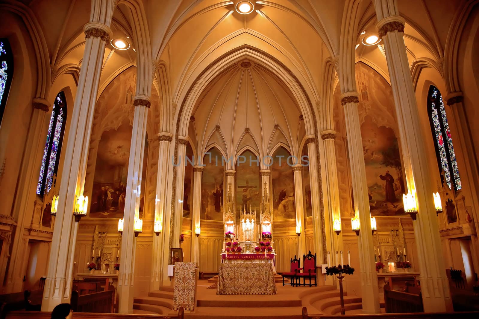 Altar and Basilica in National Shrine of Saint Francis of Assisi San Francisco California.  Church has relics of St Francis.  This church was founded in 1849 and rededicated in 1919 after church was destroyed in 1905 earthquake.