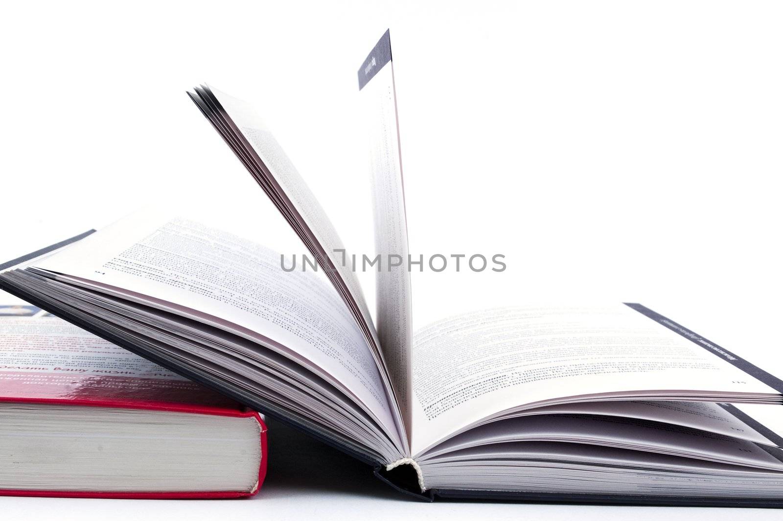 Turning pages of an empty white hardcover book by Triphka