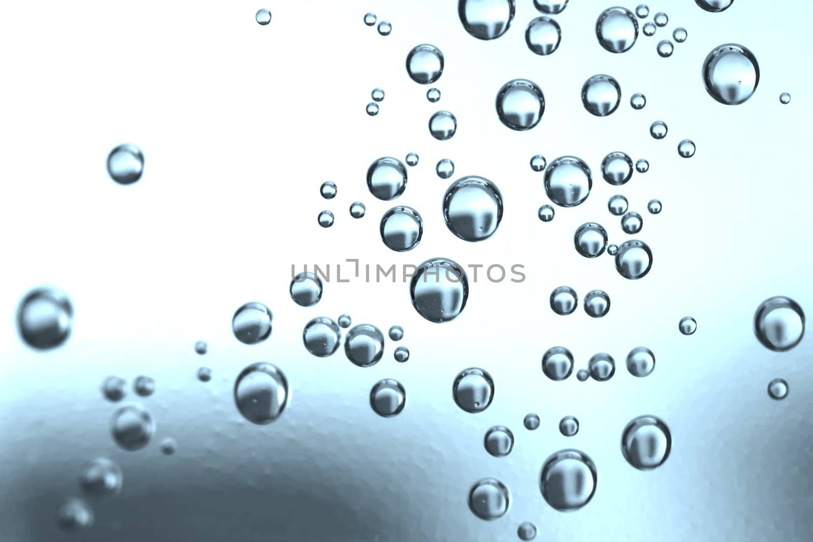 Close up of water drops on blue background