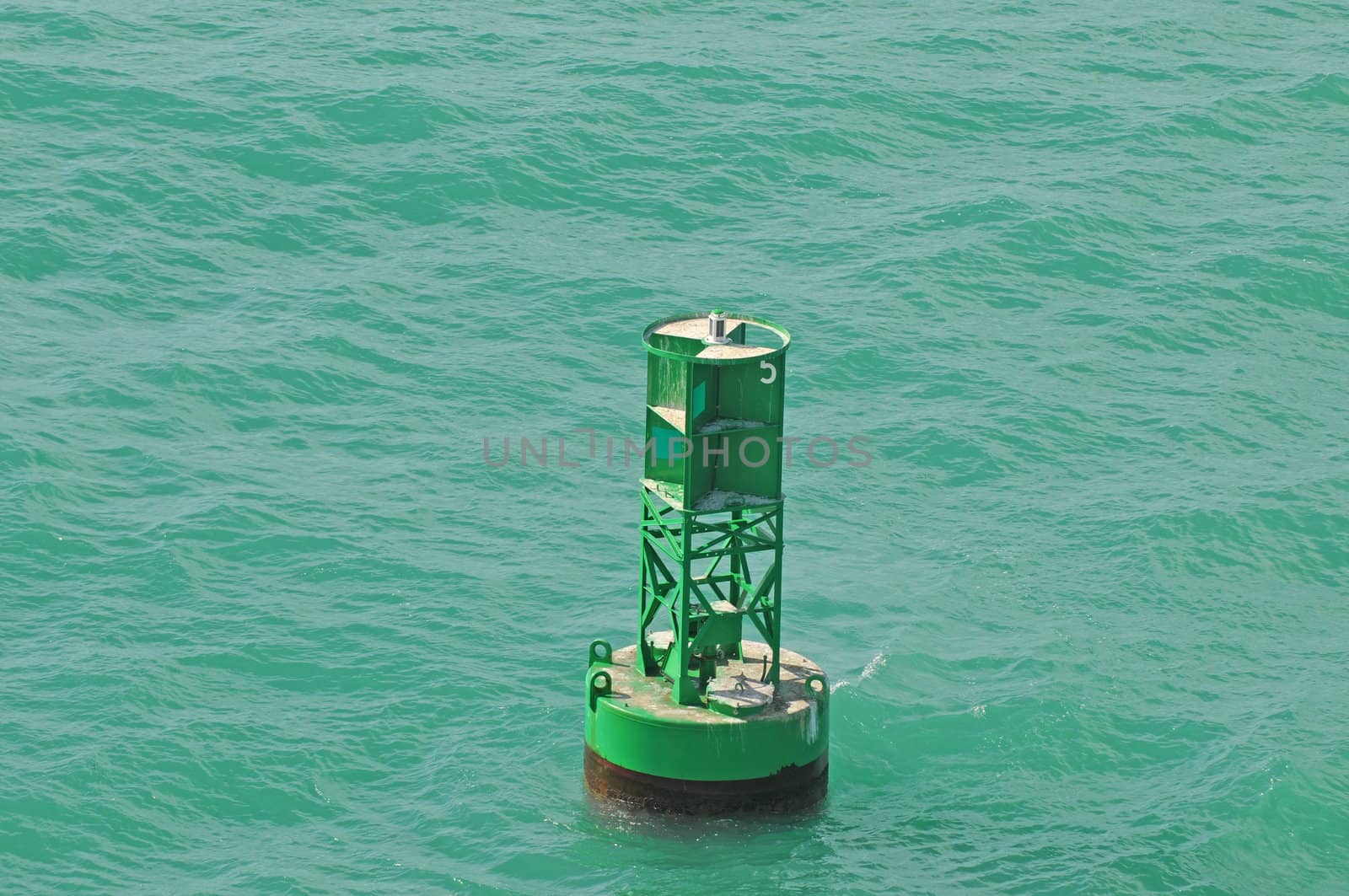 nautical buoy in ocean
