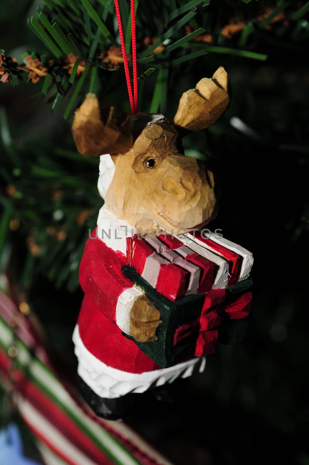 Moose christmas ornament dressed as santa