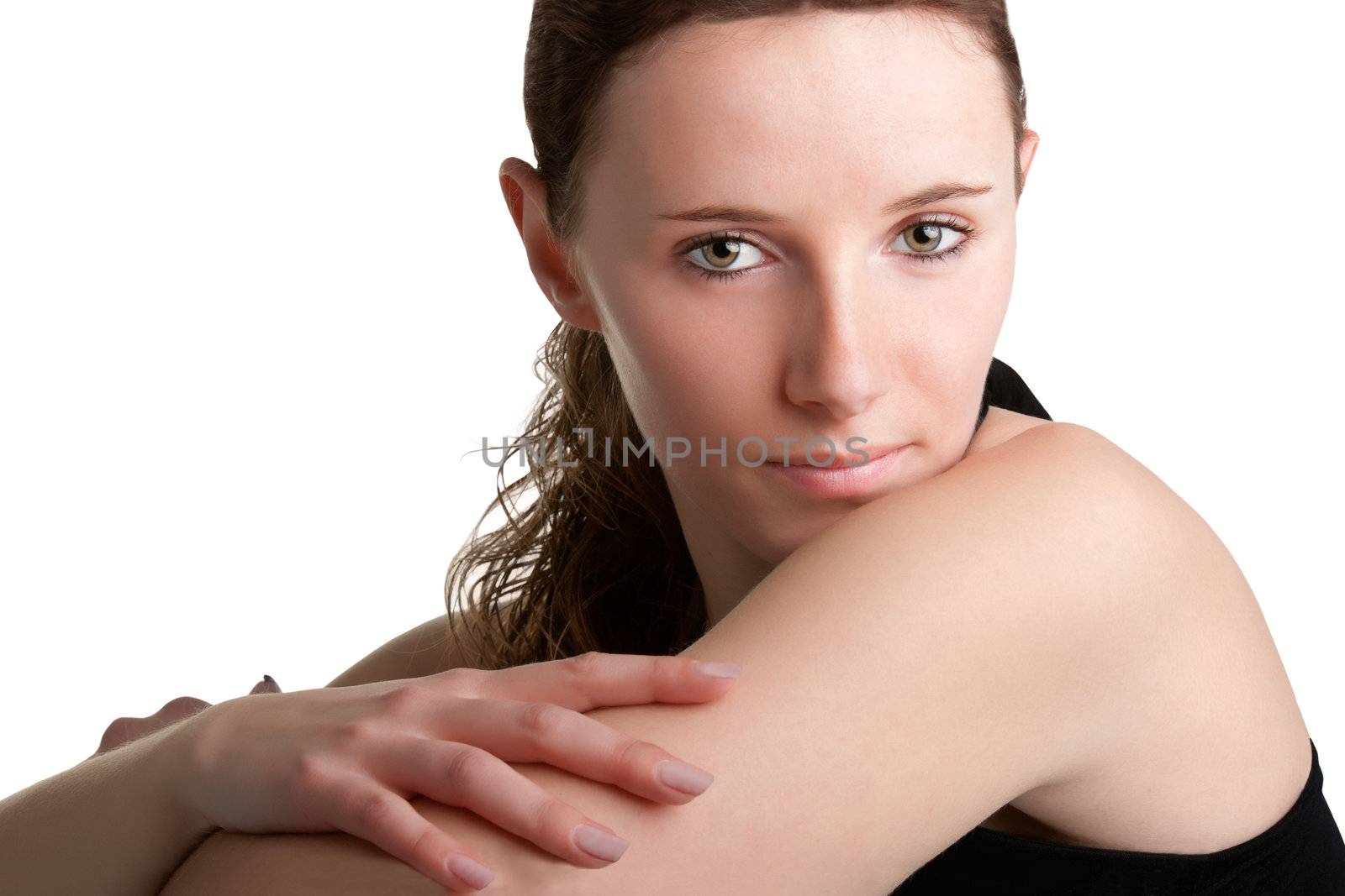 Portrait of an elegant woman looking over her shoulder, isolated in a white background